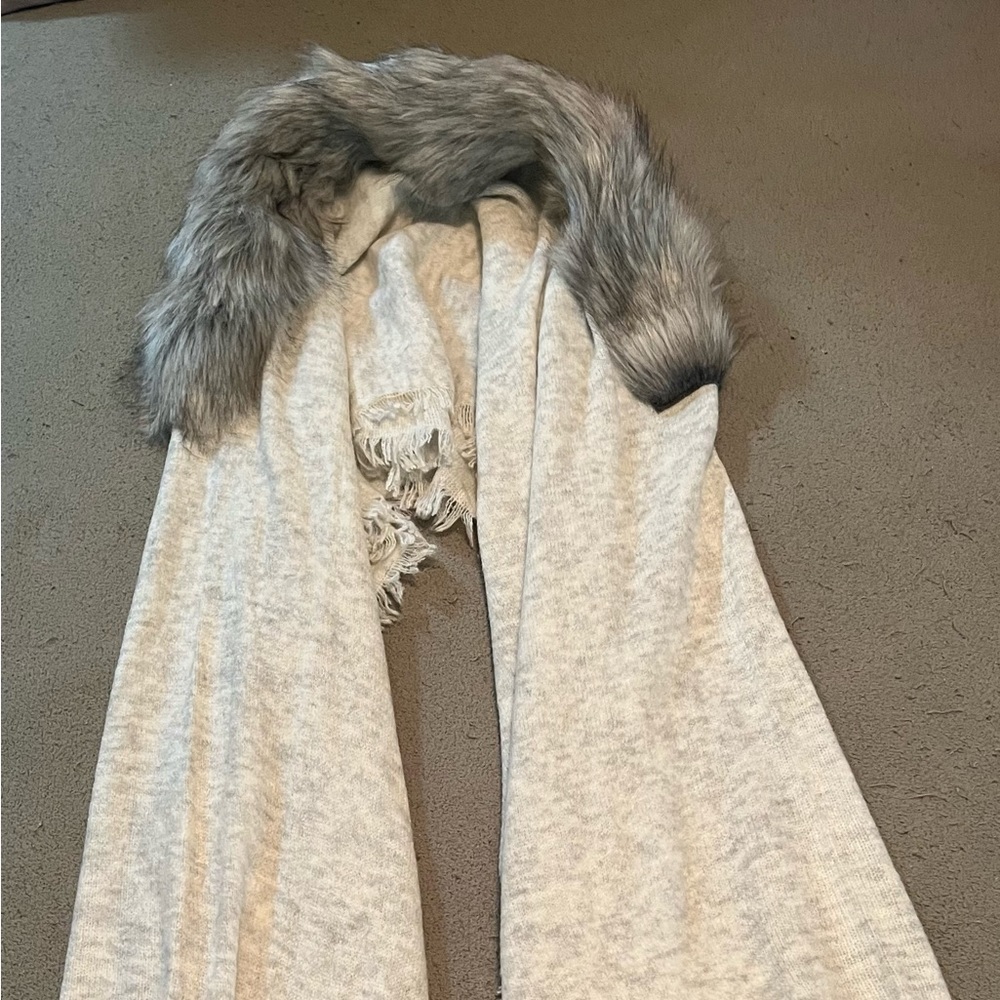 NWO tags Cabi wrap with faux fur trim.